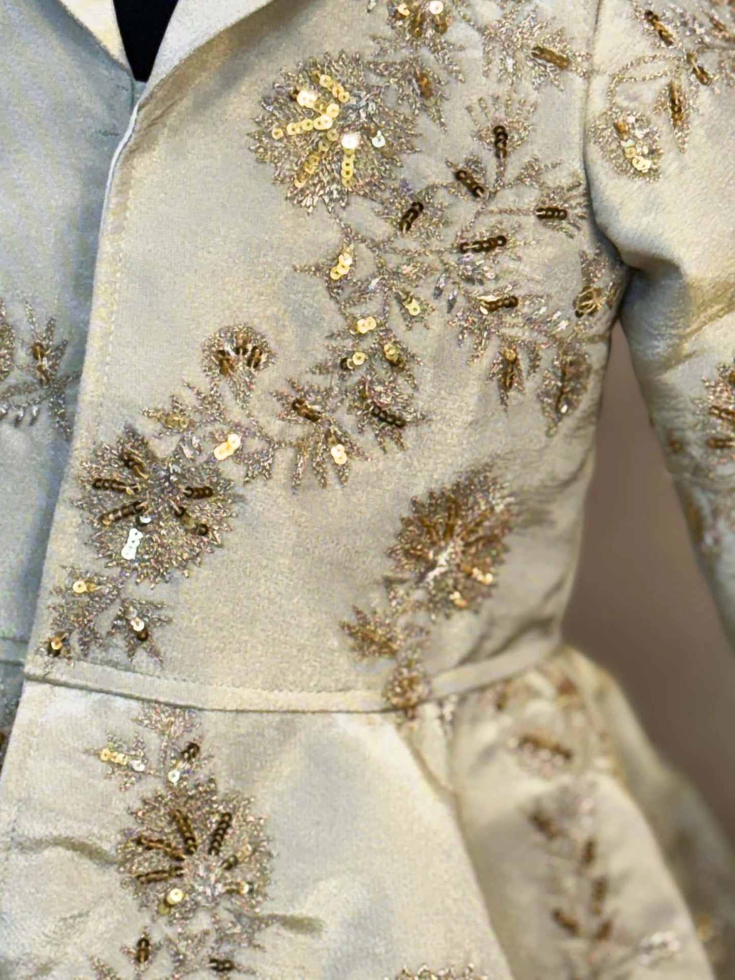 Peplum tissue jacket with hand work and tissue full circle skirt with gota work tassels