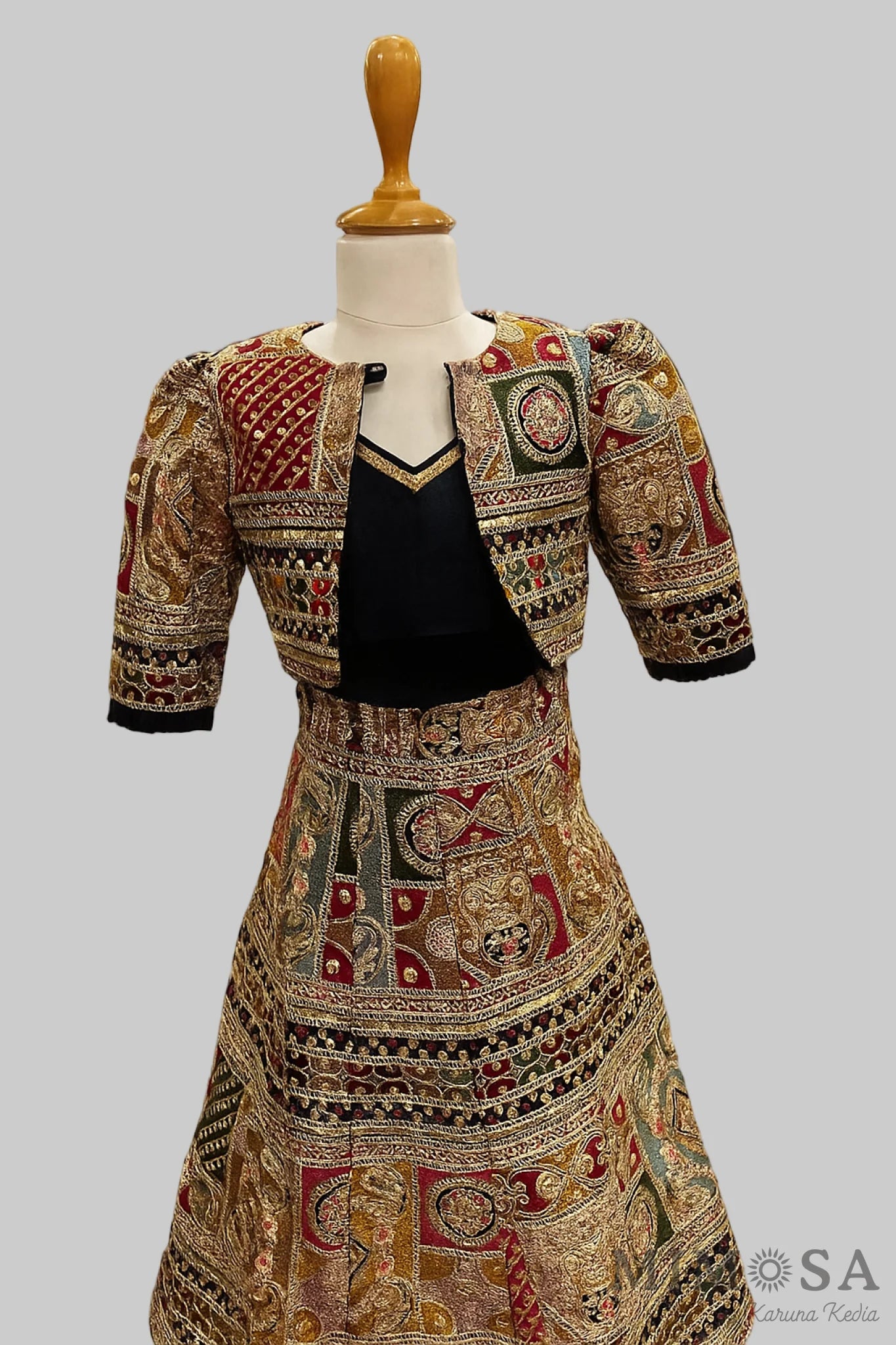 Heavy Embroidered lehnga With Matching Embroidered Jacket and with plain strap top
