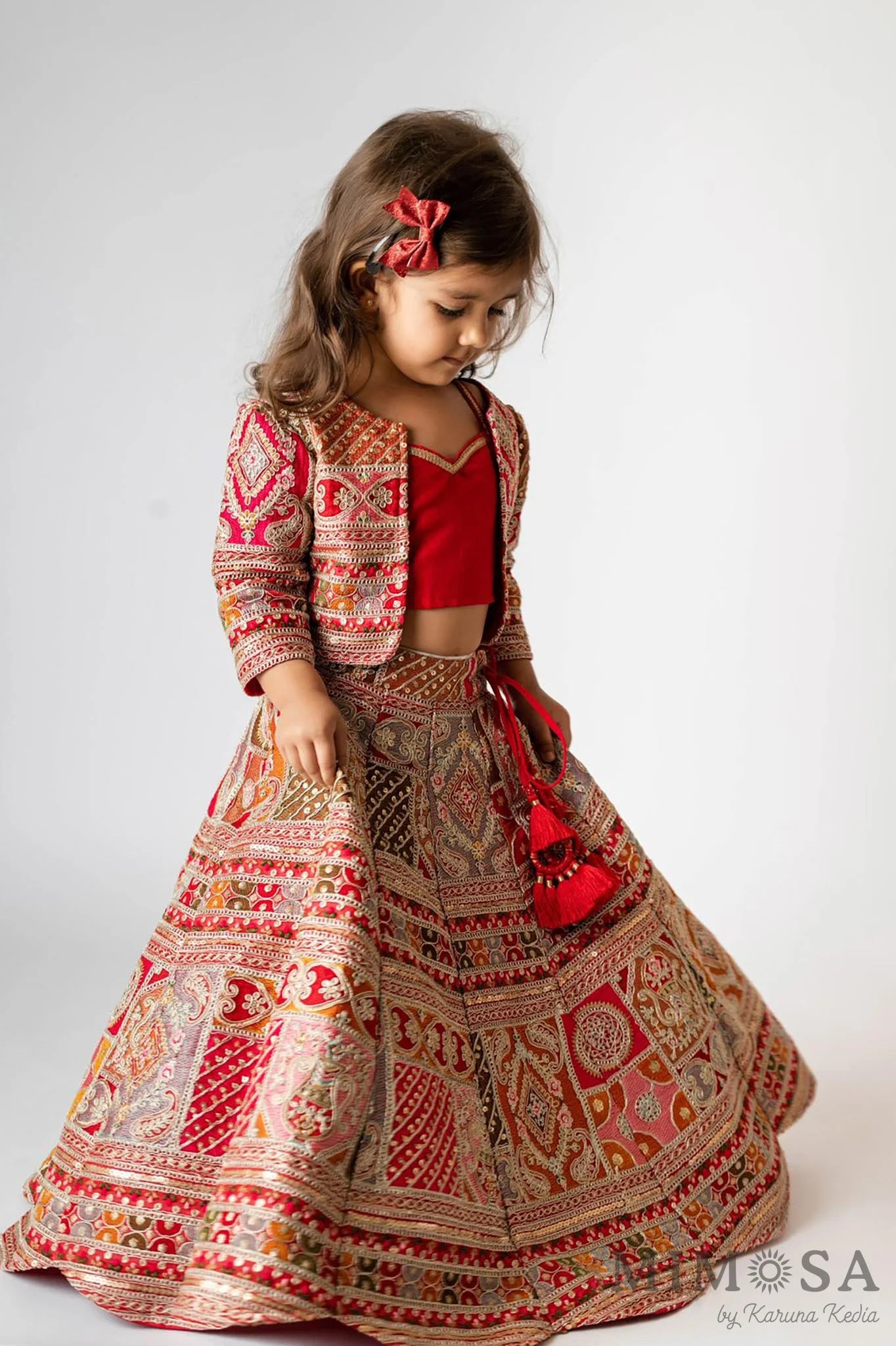 Heavy Embroidered lehnga With Matching Embroidered Jacket and with plain strap top