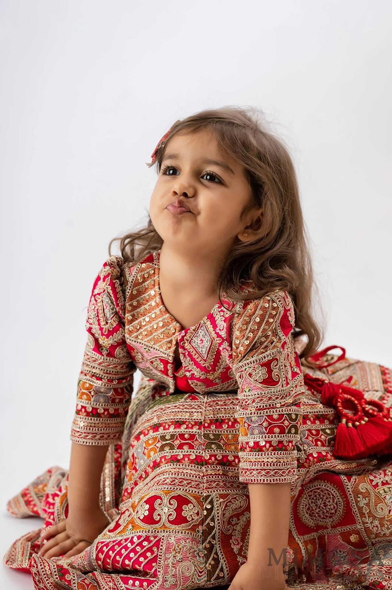 Heavy Embroidered lehnga With Matching Embroidered Jacket and with plain strap top