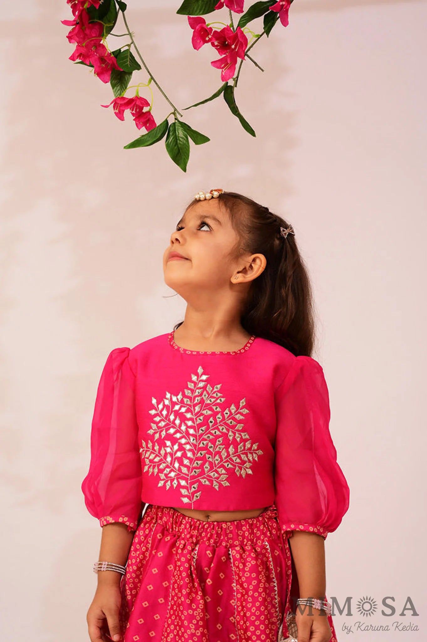 Bandhani, Print Lehnga with gota and Bambar silk blouse with mirrorwork and organza sleeves