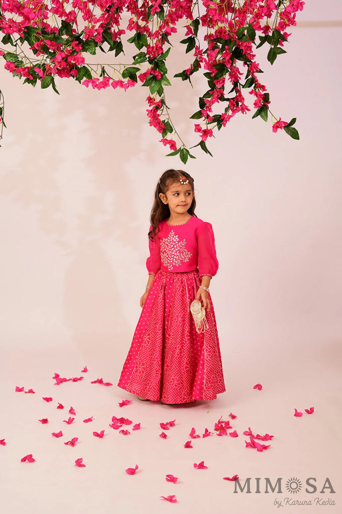 Bandhani, Print Lehnga with gota and Bambar silk blouse with mirrorwork and organza sleeves