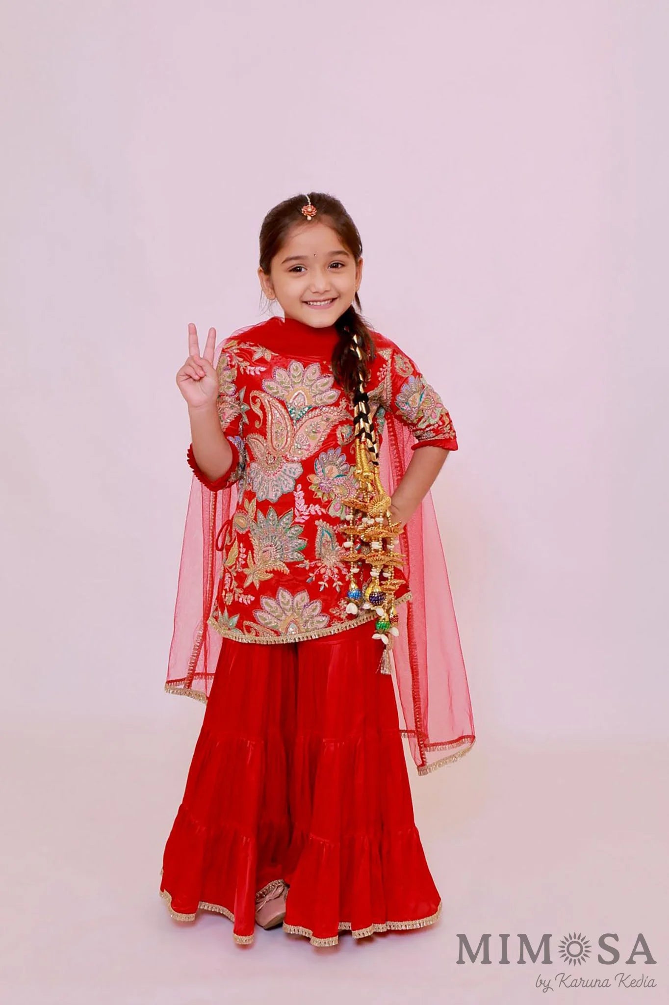Paisley traditional print on crepe with embroidery allover paired modal satin sharara and net stole