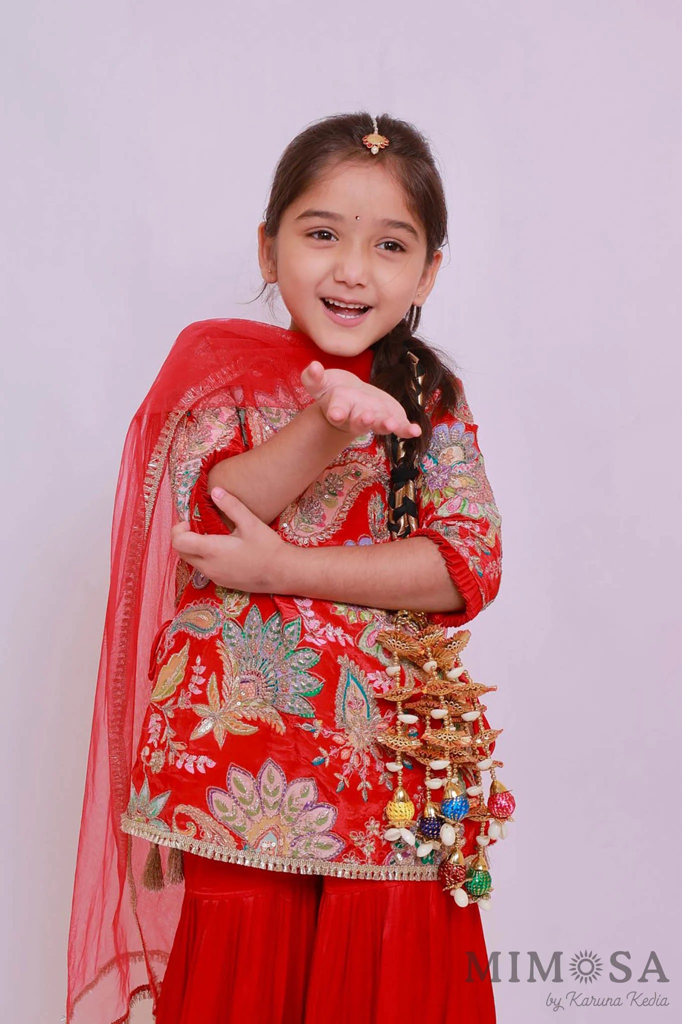 Paisley traditional print on crepe with embroidery allover paired modal satin sharara and net stole