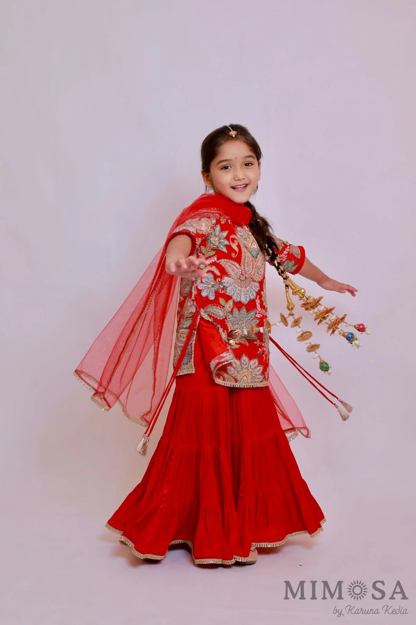 Paisley traditional print on crepe with embroidery allover paired modal satin sharara and net stole