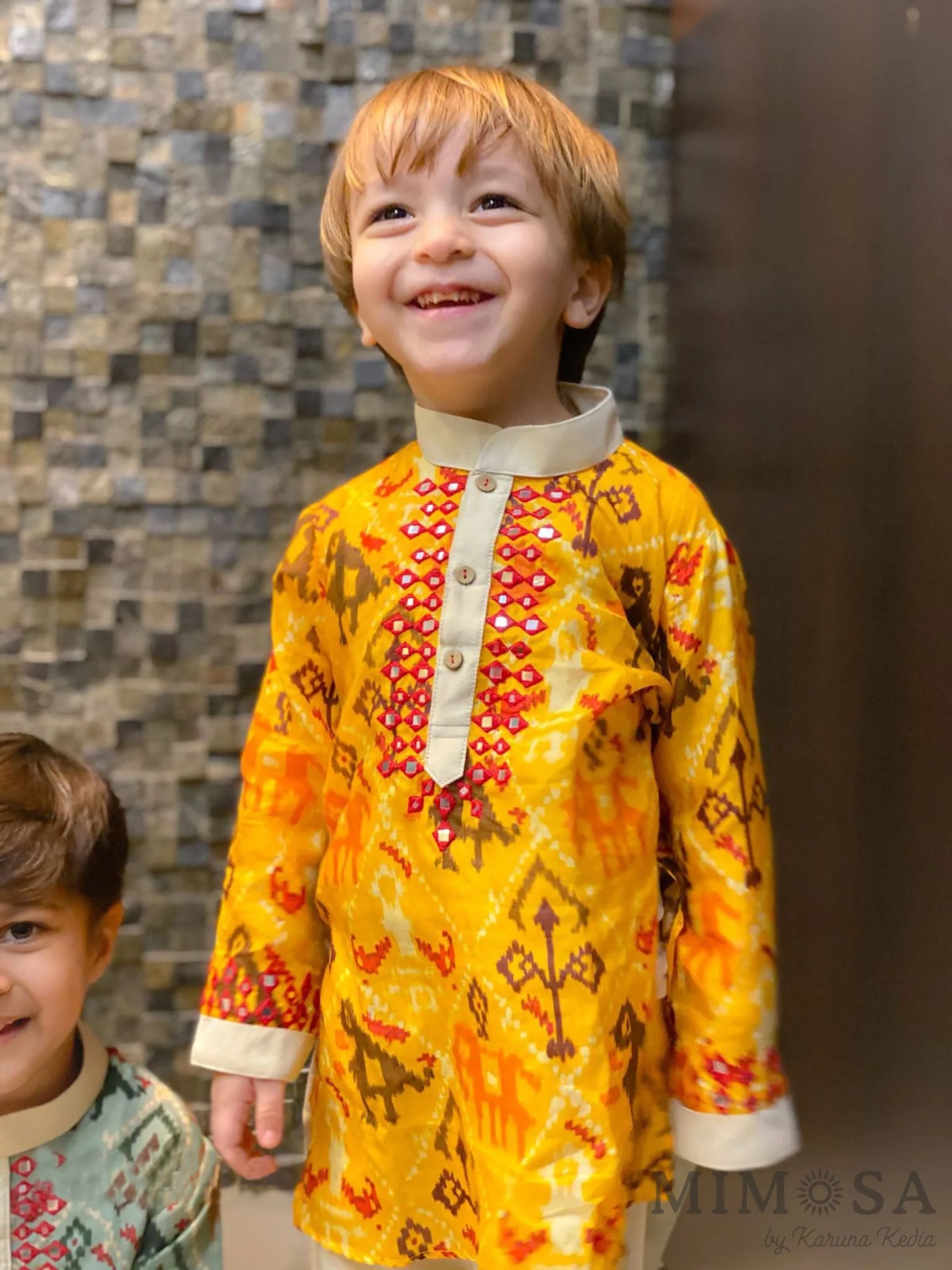Patola print Kurta with Mirror Work, comes with a cotton silk bottom with elastic and dori