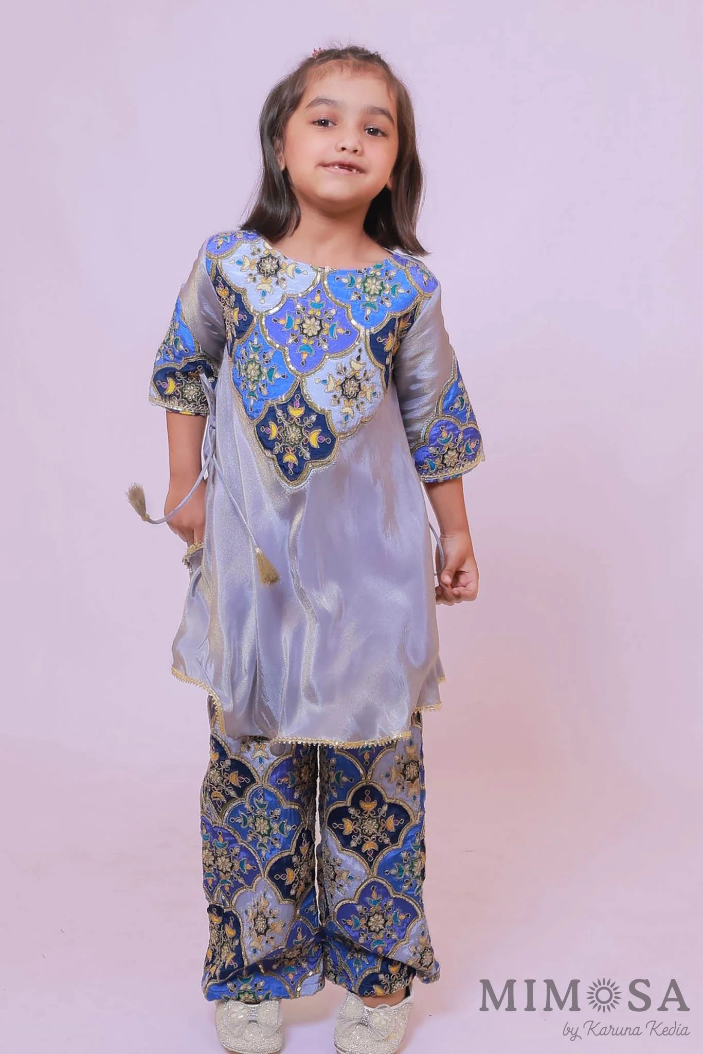 Tissue Kurta set with flared pants with embroidered yolk and lined with cotton silk