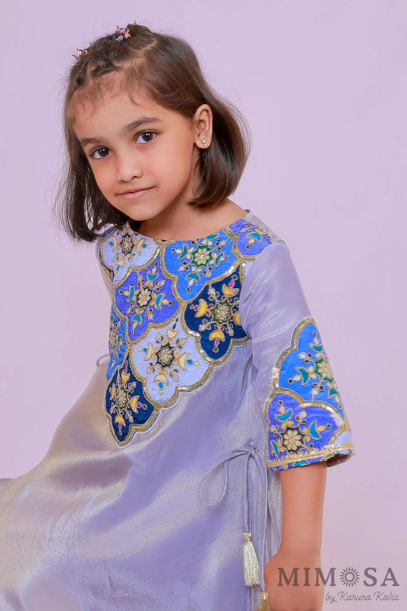 Tissue Kurta set with flared pants with embroidered yolk and lined with cotton silk
