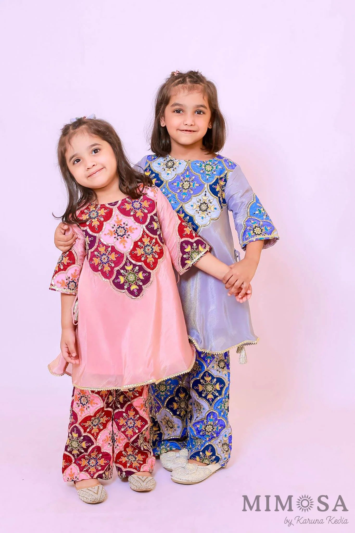 Tissue Kurta set with flared pants with embroidered yolk and lined with cotton silk