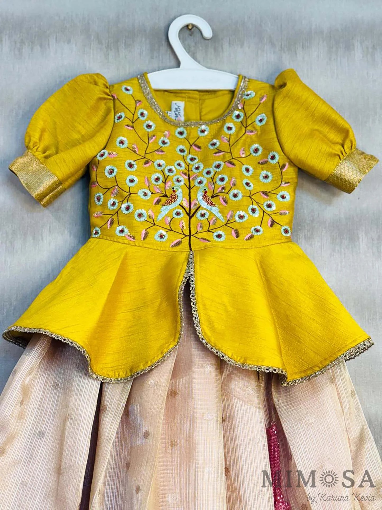 Zari Kota tissue Lehnga with Bambar silk peplum top with handwork and lined with cotton silk