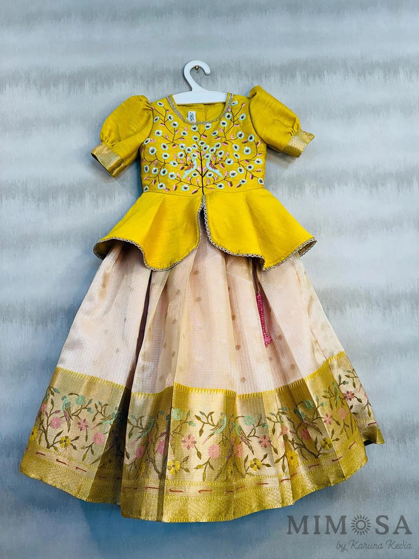 Zari Kota tissue Lehnga with Bambar silk peplum top with handwork and lined with cotton silk