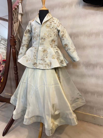 Peplum tissue jacket with hand work  and tissue full circle skirt with gota work tassels