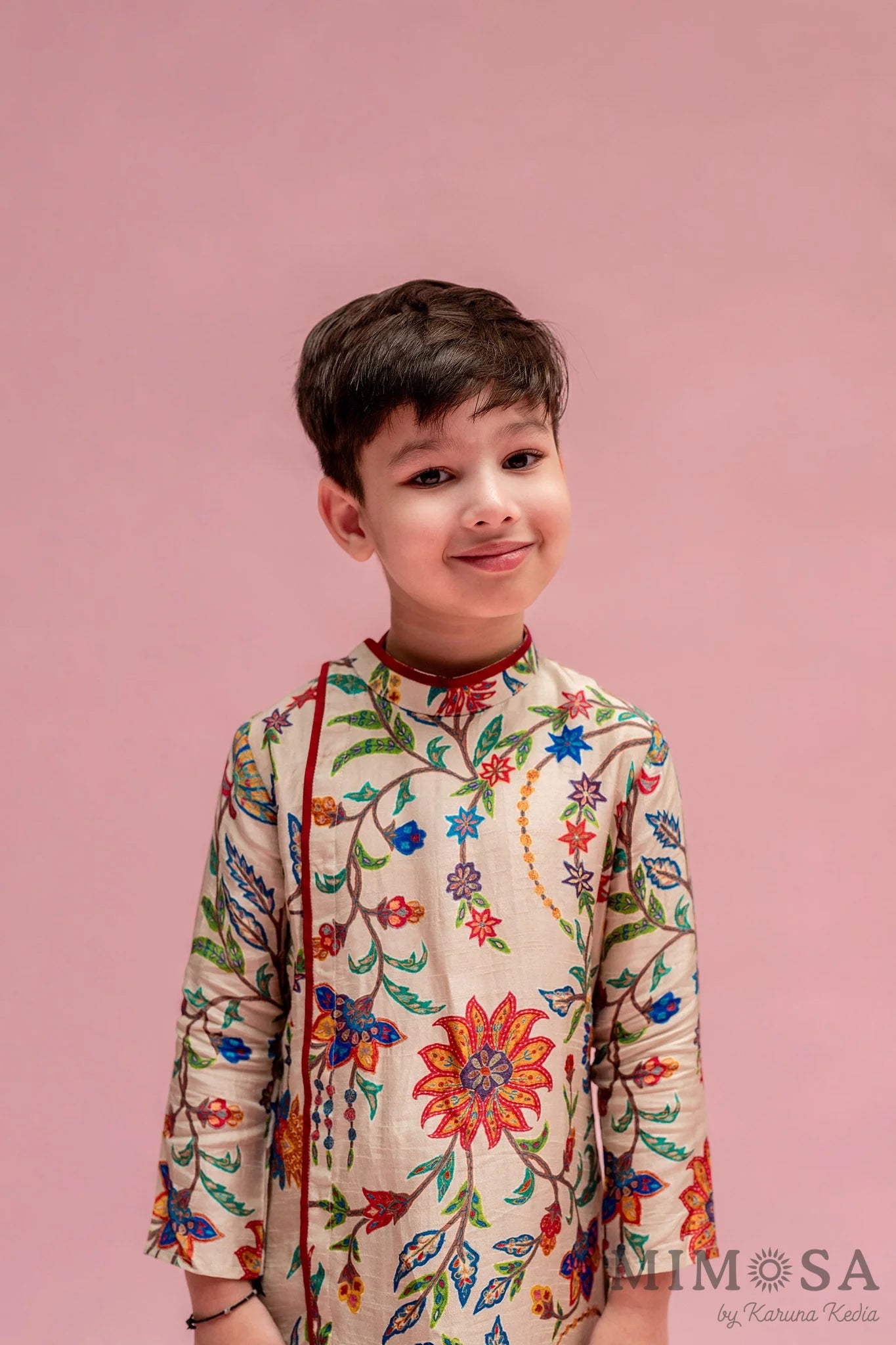 Asymmetrical side cut boys kurta in Bambar silk with cotton silk bottoms