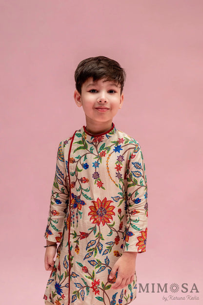 Asymmetrical side cut boys kurta in Bambar silk with cotton silk bottoms