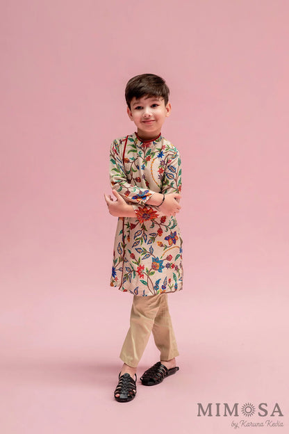 Asymmetrical side cut boys kurta in Bambar silk with cotton silk bottoms