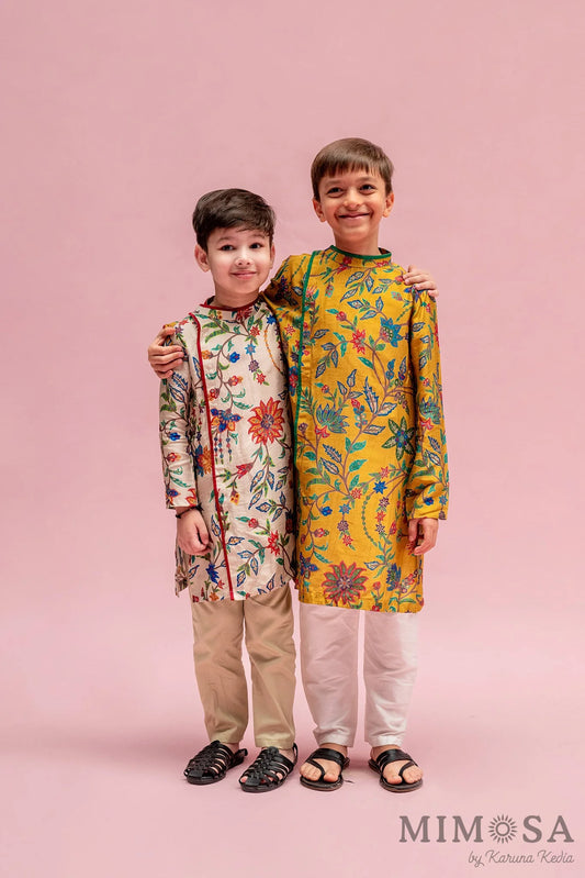 Asymmetrical side cut boys kurta in Bambar silk with cotton silk bottoms