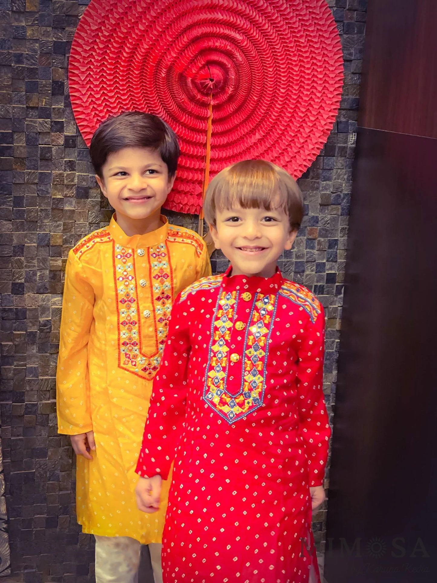 Bandi print Kurta with Mirror work embroidery around neck and shoulder, comes with bottom