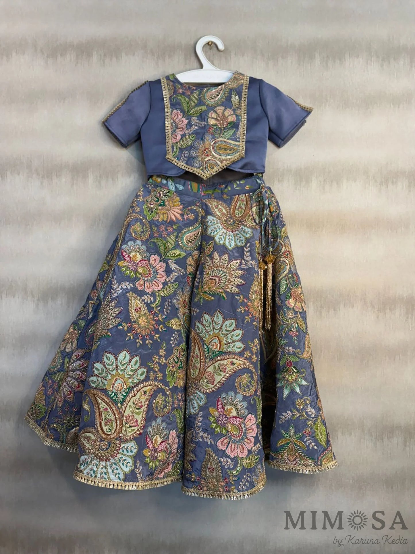 Beautiful Paisley print Lehnga with embroidery all over and model Satin top