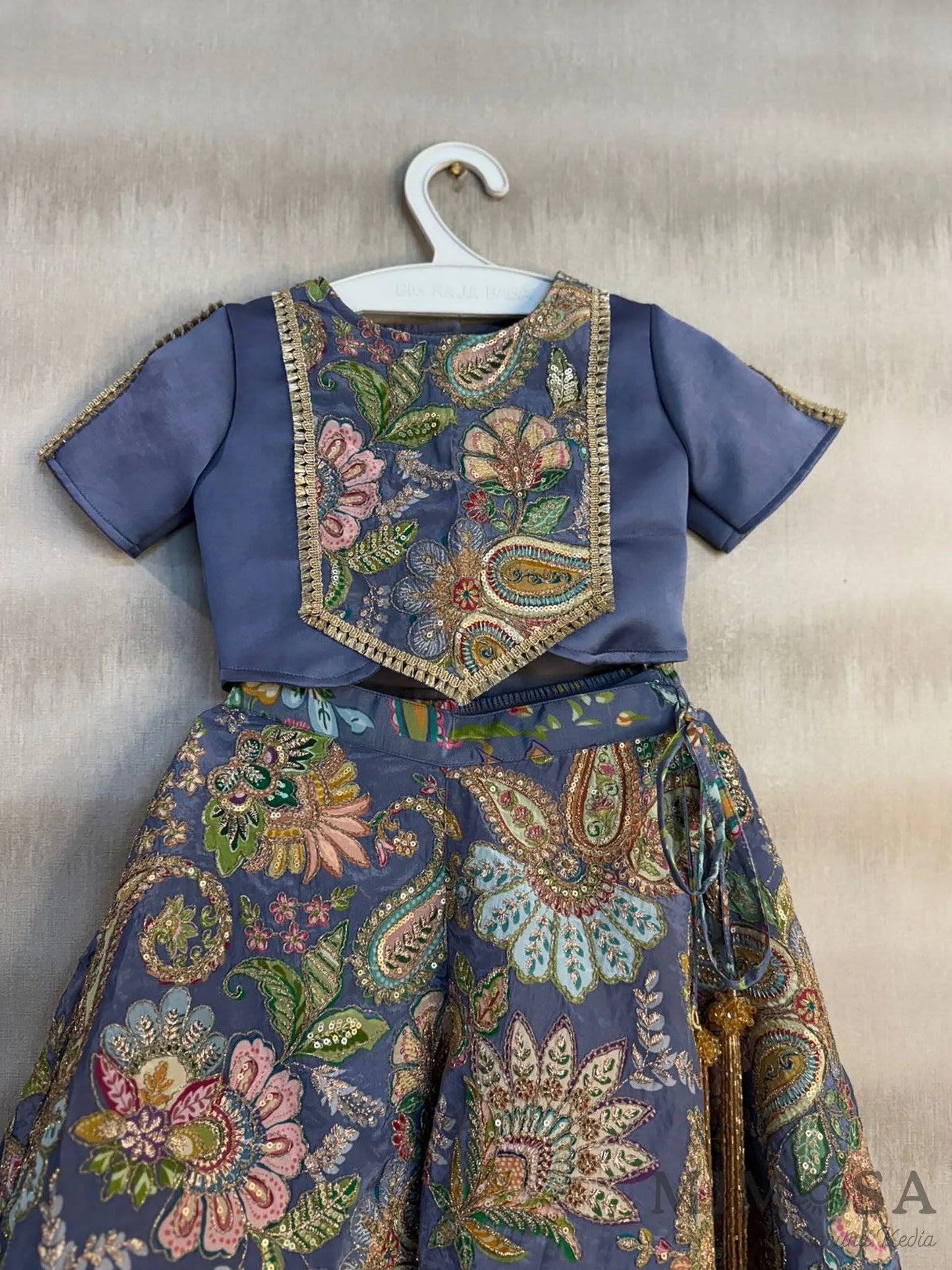 Beautiful Paisley print Lehnga with embroidery all over and model Satin top