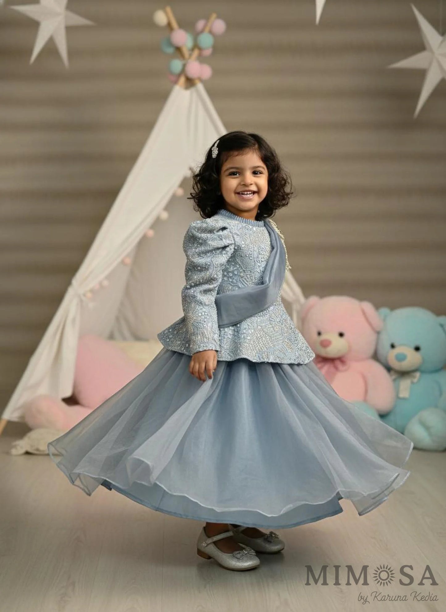 Embroidered Peplum gown