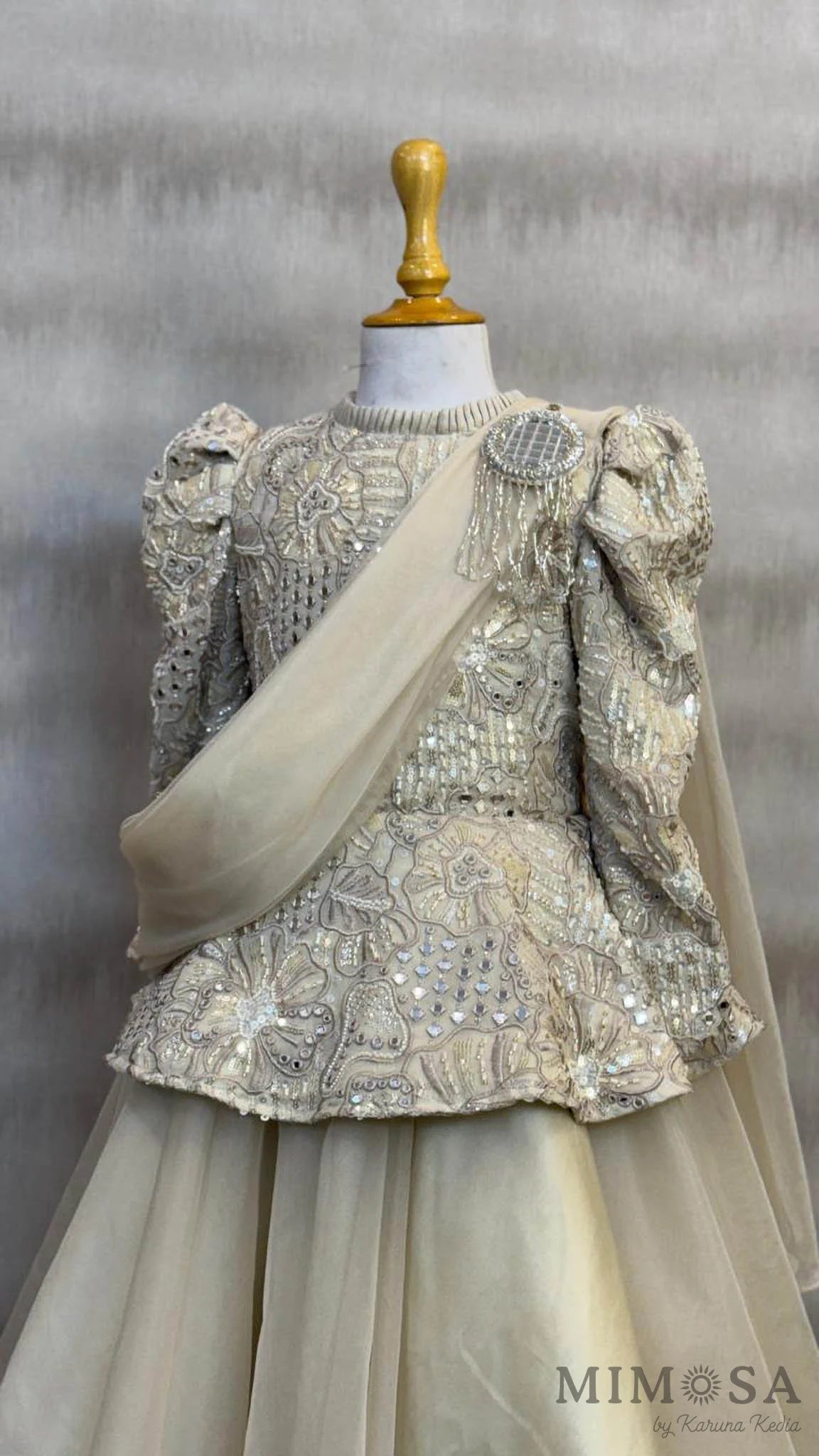 Embroidered Peplum gown