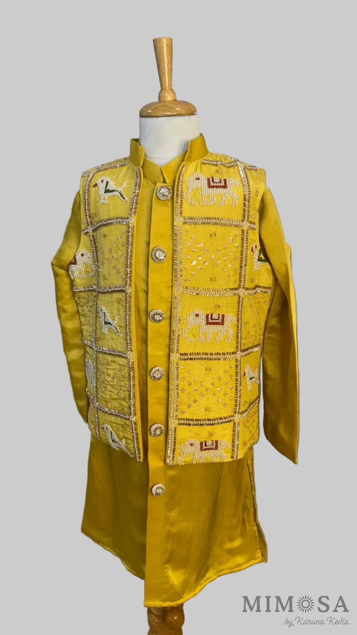 Linen satin kurta set with intricately embroidered jacket