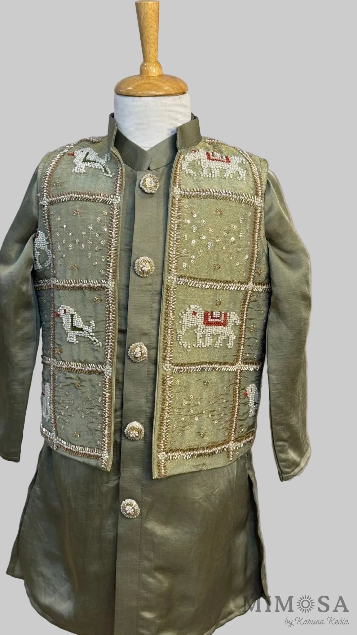 Linen satin kurta set with intricately embroidered jacket
