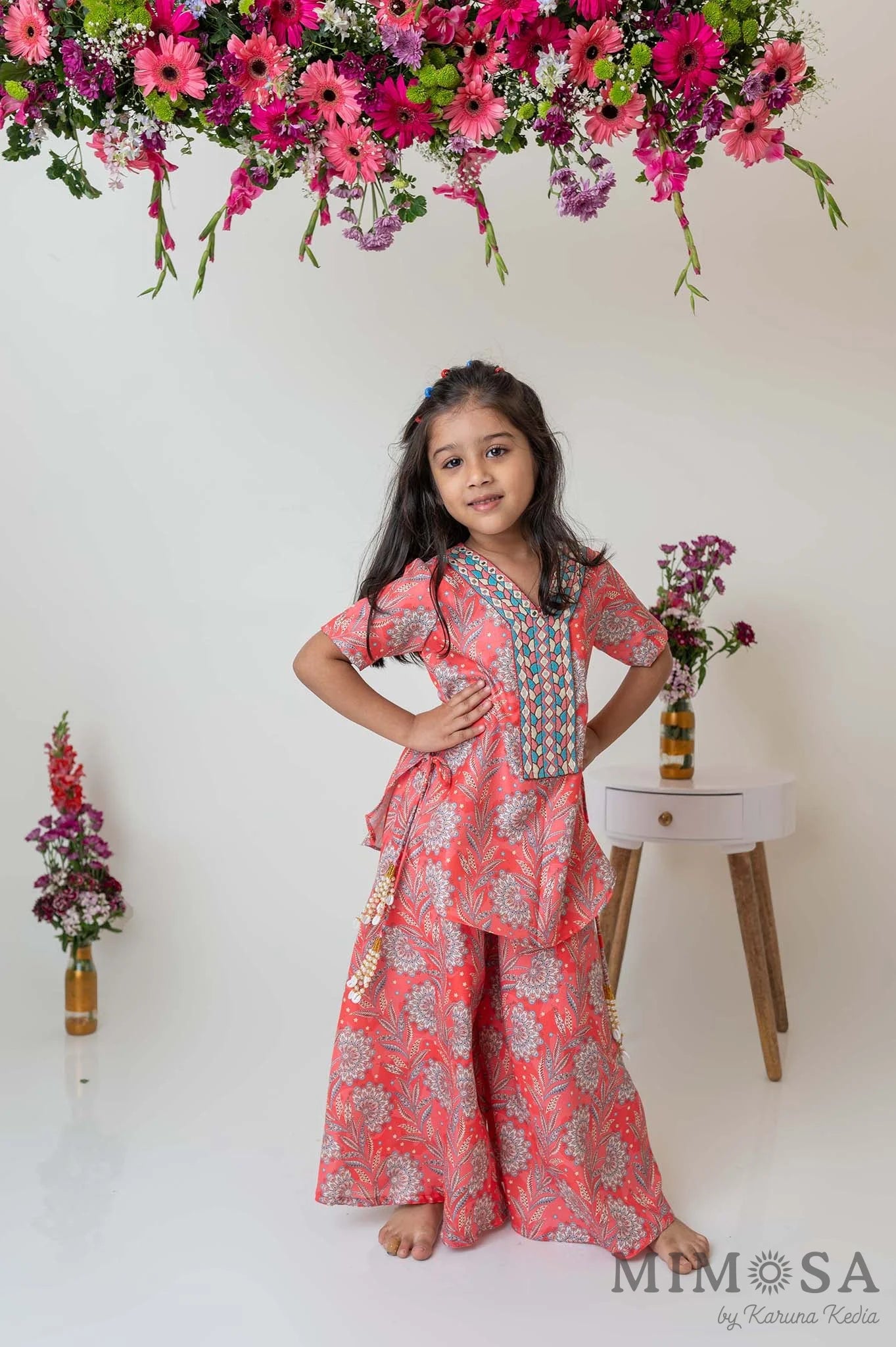 Paisley print kurti with embroidered yoke and flared palazzo