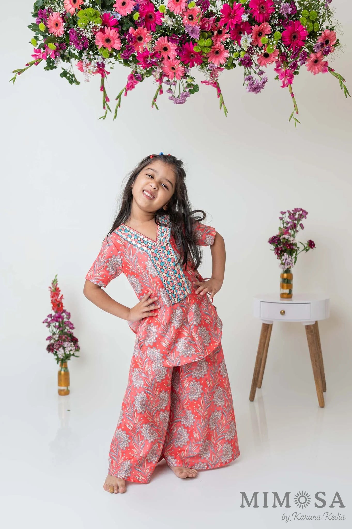 Paisley print kurti with embroidered yoke and flared palazzo
