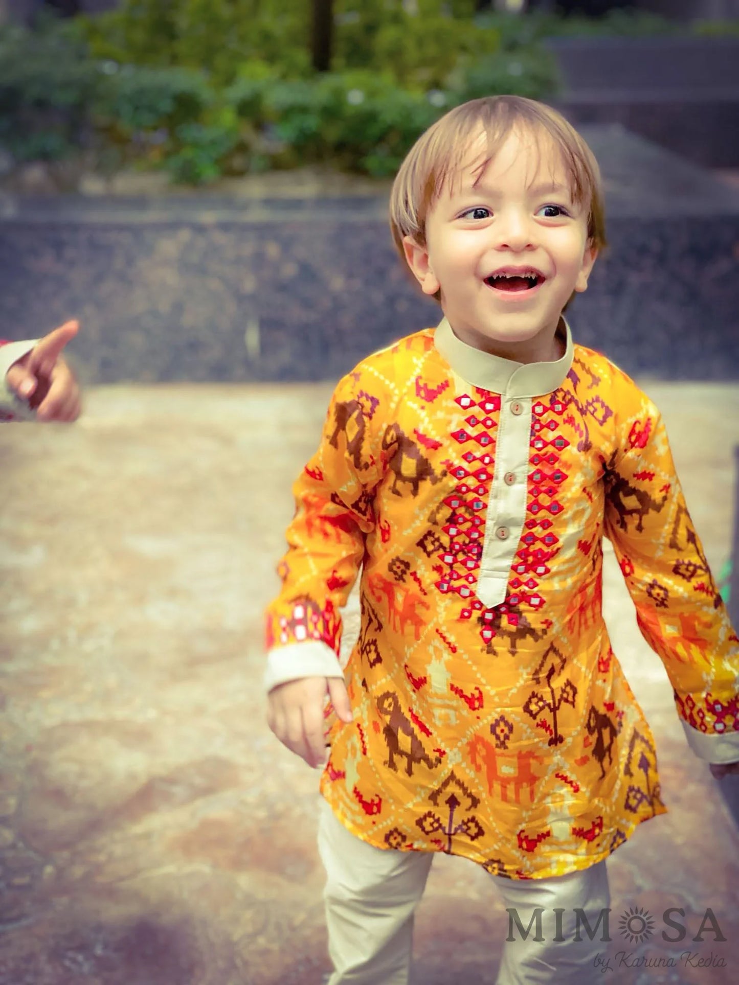 Patola print Kurta  with Mirror Work, comes with a cotton silk bottom with elastic and dori