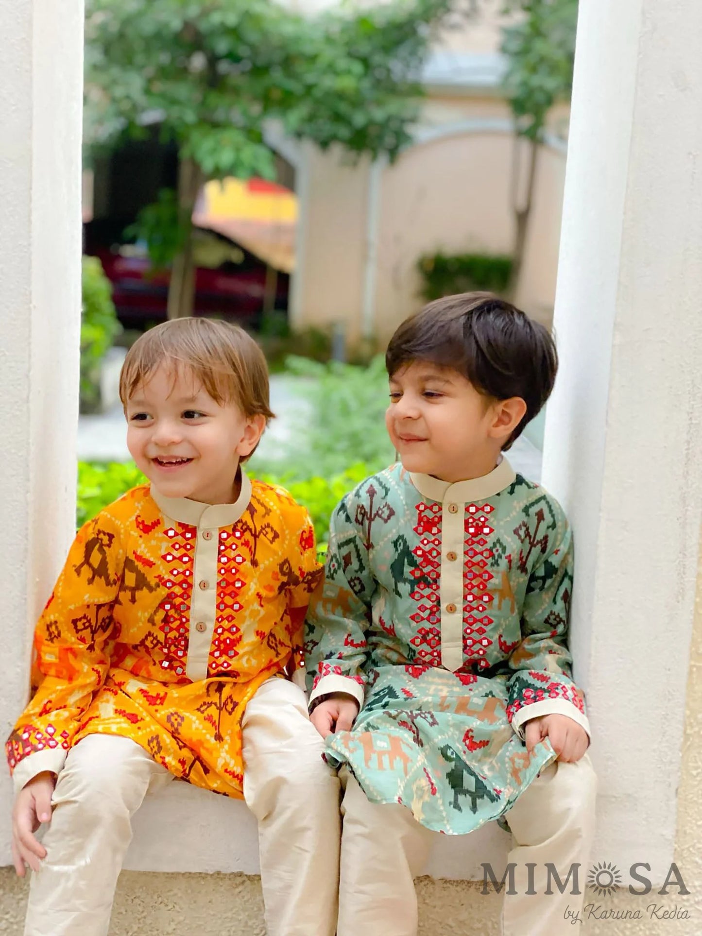 Patola print Kurta  with Mirror Work, comes with a cotton silk bottom with elastic and dori