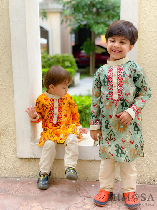 Patola print Kurta  with Mirror Work, comes with a cotton silk bottom with elastic and dori