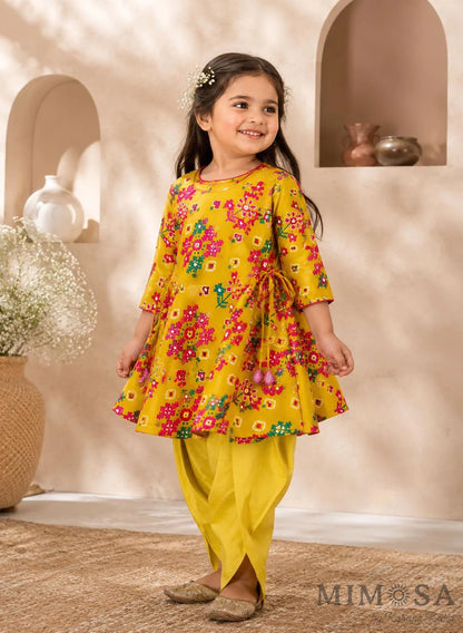 Pure Chanderi silk peplum top highlighted with mirror  work paired with tulip pants