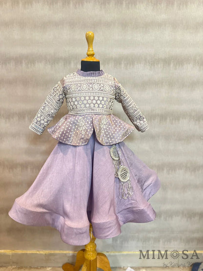 Tissue brocade, peplum blouse with Bamber silk skirt with tassels and organza Dupatta with allover buta