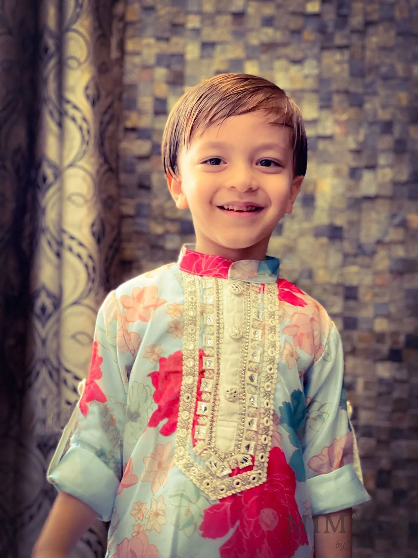 Vibrant floral print lined Kurta with Mirror Work borders comes with bottoms also has roll up sleeves