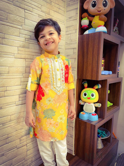 Vibrant floral print lined Kurta with Mirror Work borders comes with bottoms also has roll up sleeves