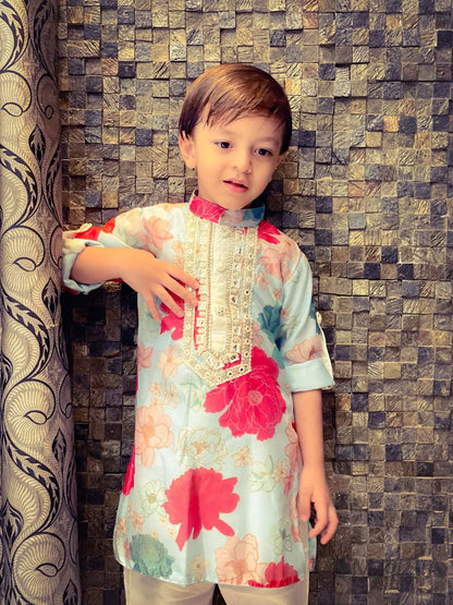 Vibrant floral print lined Kurta with Mirror Work borders comes with bottoms also has roll up sleeves
